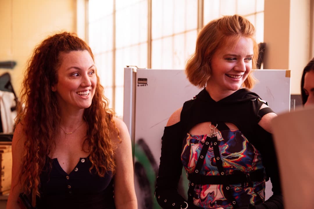 Behind the scenes photo 59 from Clone Cops production showing laura holloway and allison shrum between scenes